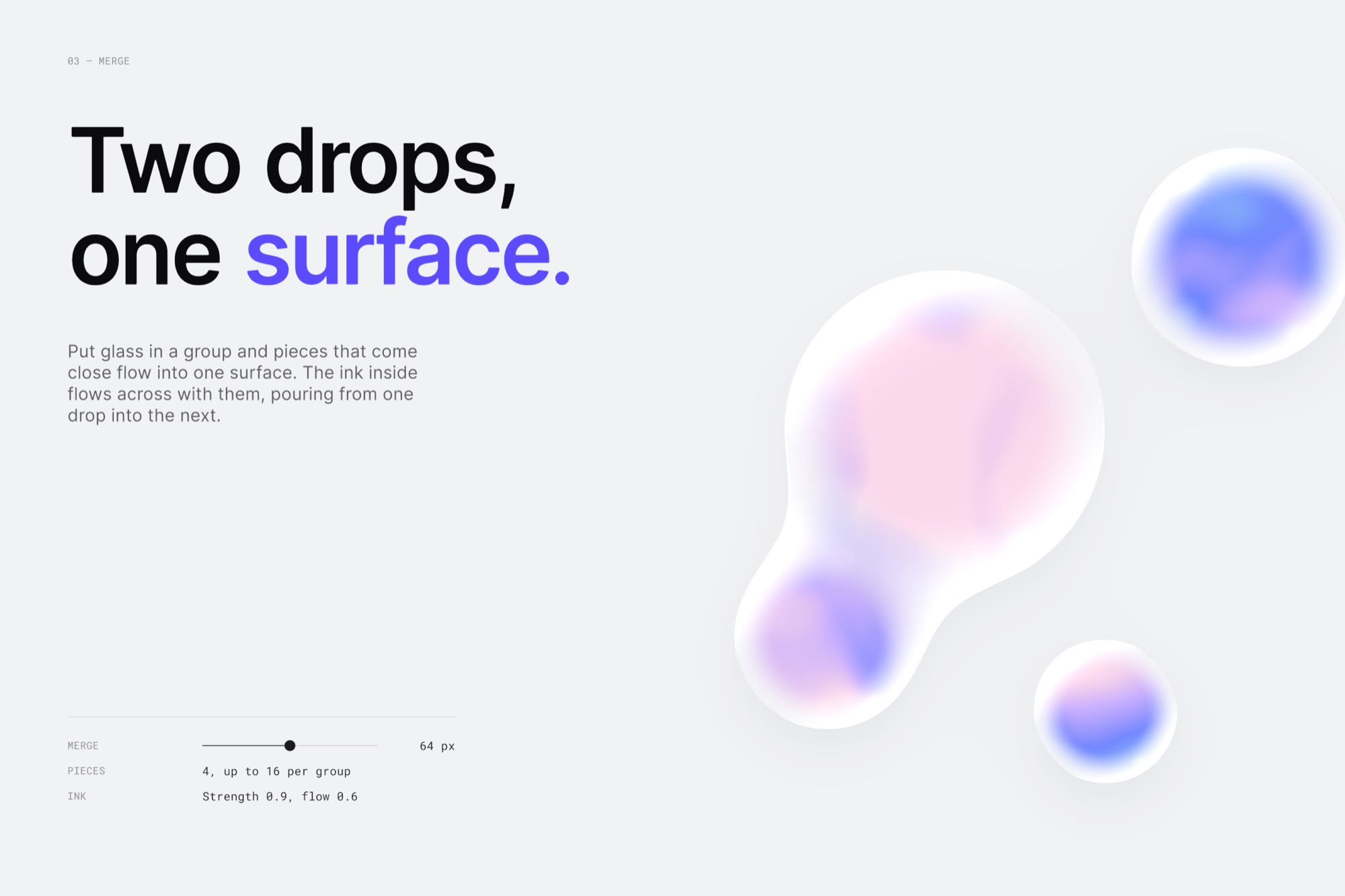 Glass drops with pink and blue ink melting into one surface on a light grey page.